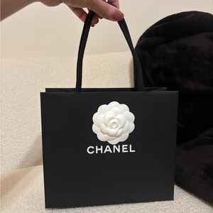 CHANEL Black Tote with White Floral Accent